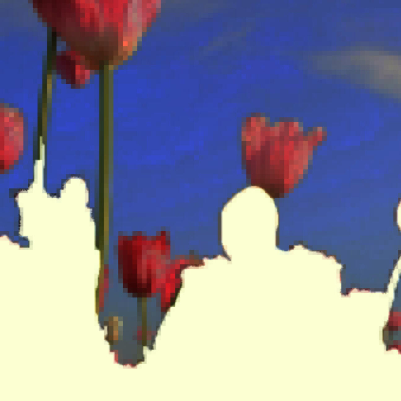 Image from Stone Soup event from 2023 Desert Biennial Project. Features bright orange diamond sign with black lettering spelling out Desert Biennial Project behind a sign made from dimensional lumber with Stone Soup painted in red on front of sign.