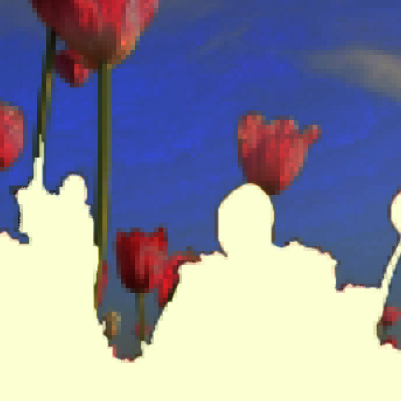 Image from Stone Soup event from 2023 Desert Biennial Project. Features bright orange diamond sign with black lettering spelling out Desert Biennial Project behind a sign made from dimensional lumber with Stone Soup painted in red on front of sign.